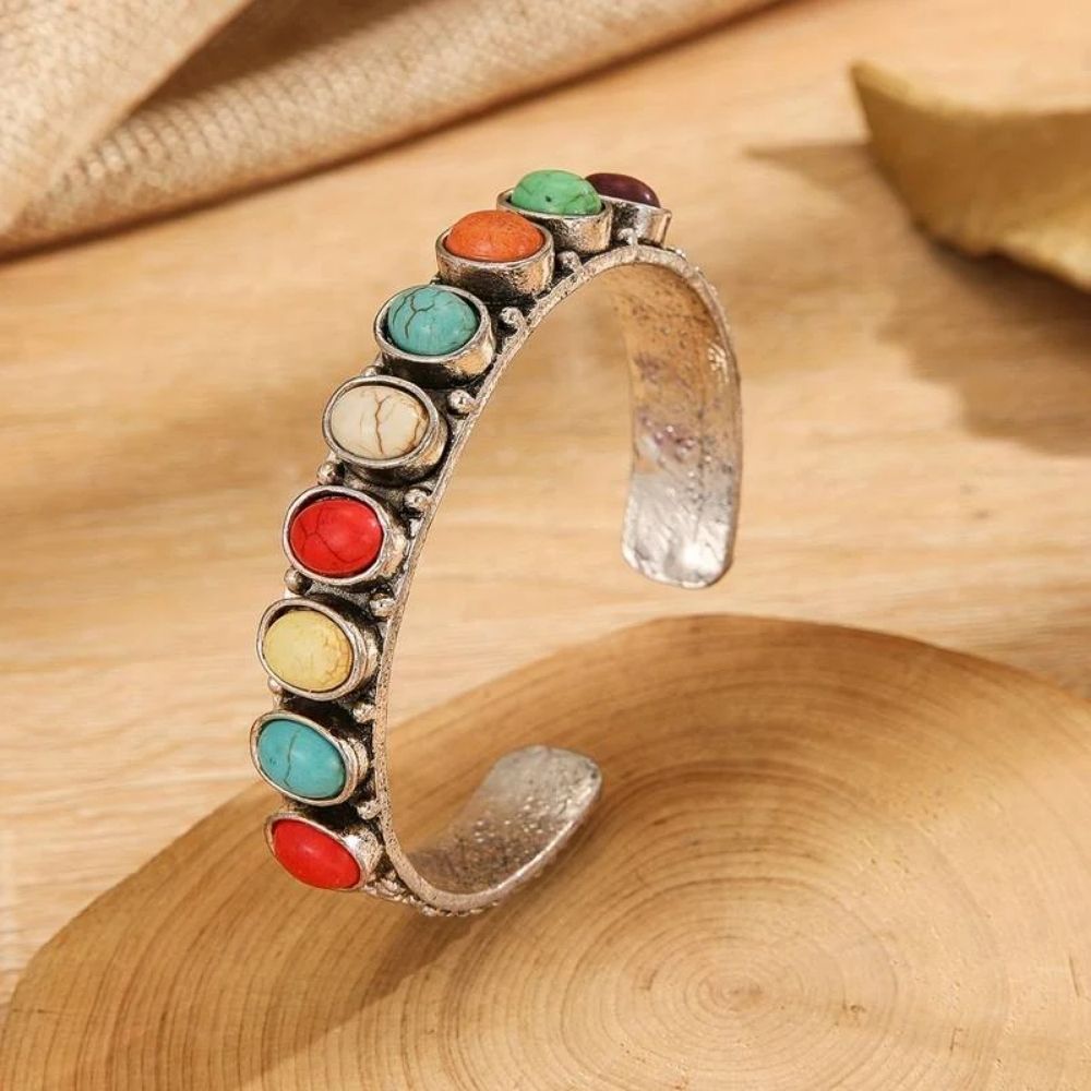 Farvespil | Sølvfarvet bangle med farvede sten – Visning 01