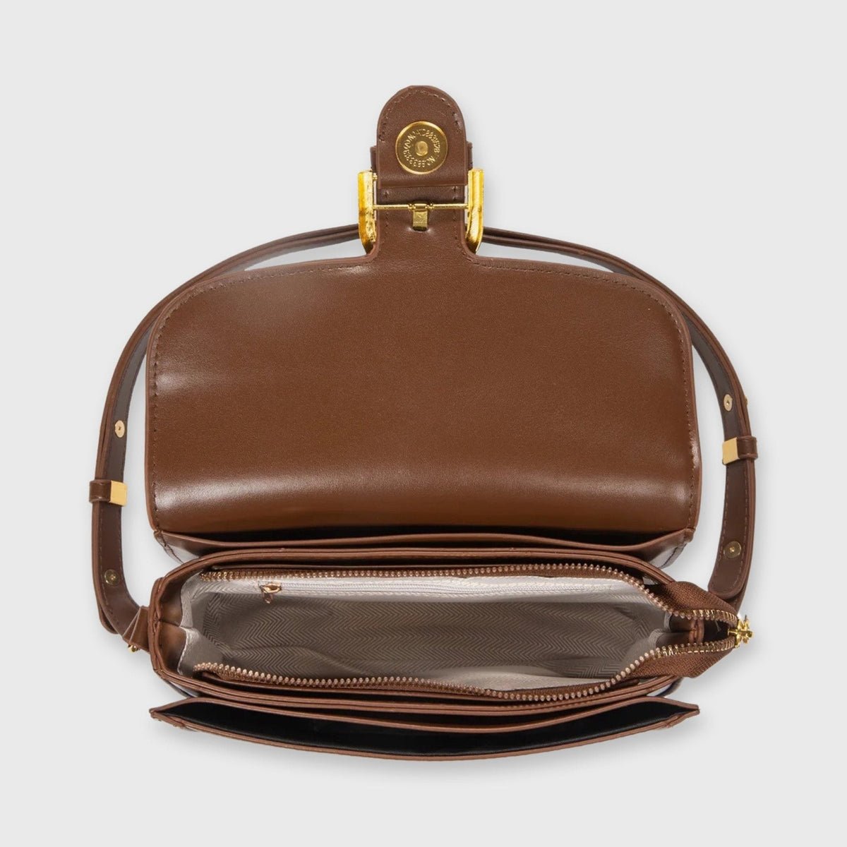 Brun Bella mini skuldertaske set fra siden