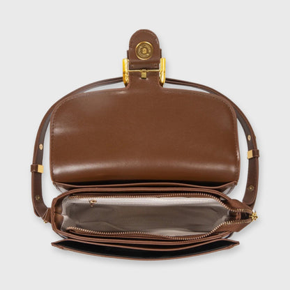 Brun Bella mini skuldertaske set fra siden
