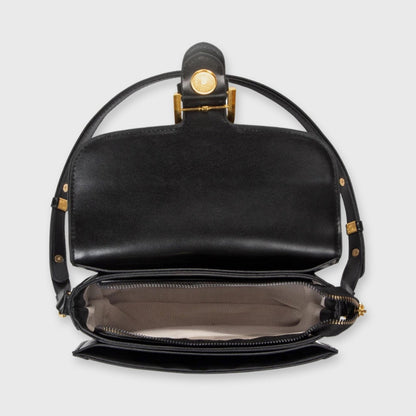 Sort Bella mini skuldertaske set fra siden